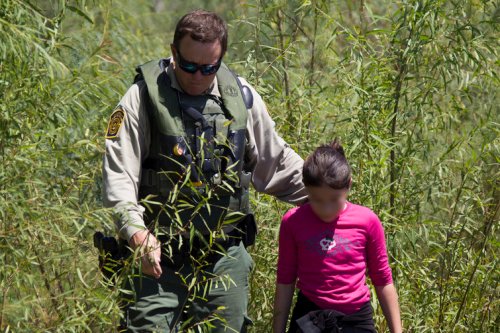 Border Patrol rescues immigrant girl stranded on banks of Rio Grande. US Customs and Border Protection on Flickr, Some rights reserved