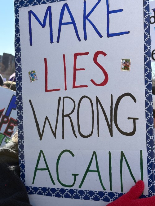 Protest sign: Make Lies Wrong Again