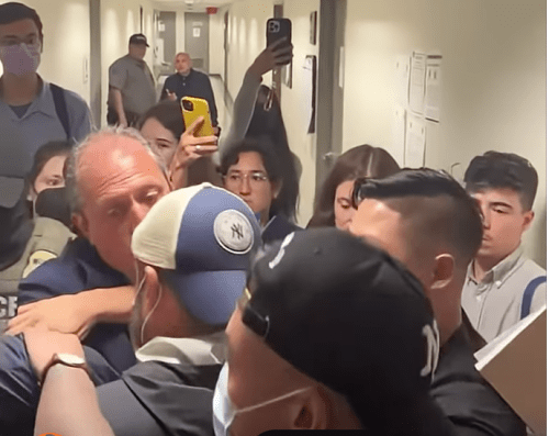 NYC Controller Brad Lander being arrested outside immigration court, surrounded by federal agents